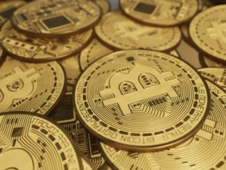 pile of Bitcoins on a table